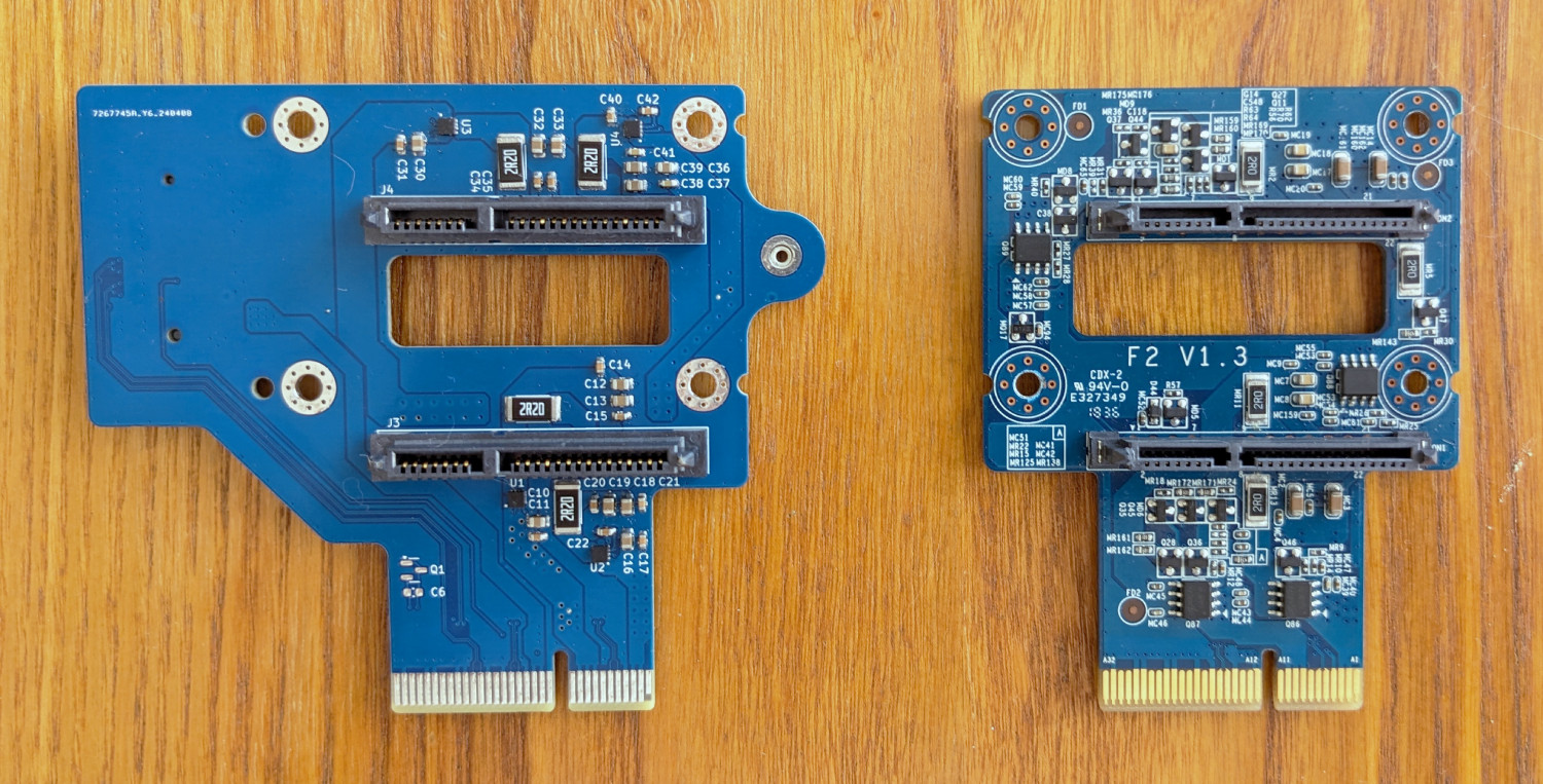 Picture of the back of the new backplane PCB next to the original one.